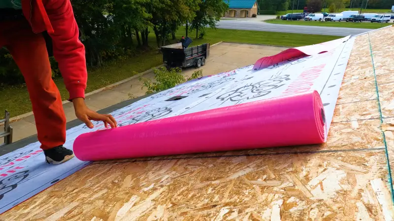 Roof restoration with new underlayment being installed in Northeast Ohio