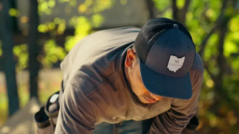 Nailed Down Roofing contractor working on a roof